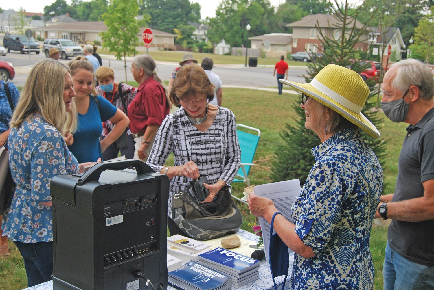 Paula Kochert, from left, Madeline Kochert and Nancy Gineris speak with Helen Hudson, president of the League of Women Voters of Montgomery County, and her husband Marc after the dedication of a plaque honoring pioneering physician and suffragist Dr. Mary Holloway Wilhite on Wednesday. Gineris and the Kocherts are descendants of Wilhite.